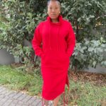 Stylish and cozy hooded midi dress, perfect for creating an effortlessly chic look