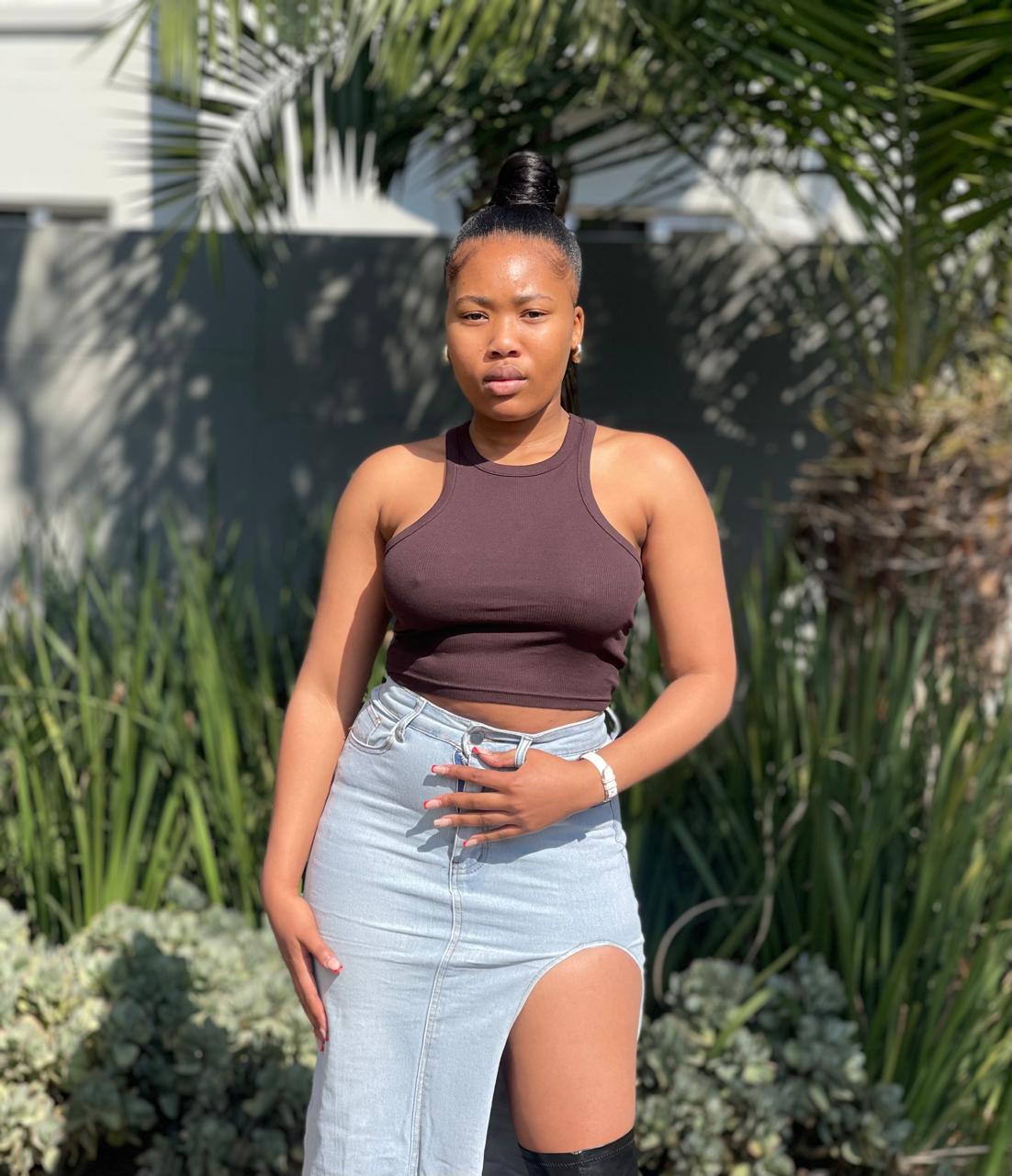 Stylish high slit denim skirt offering a sleek and bold look