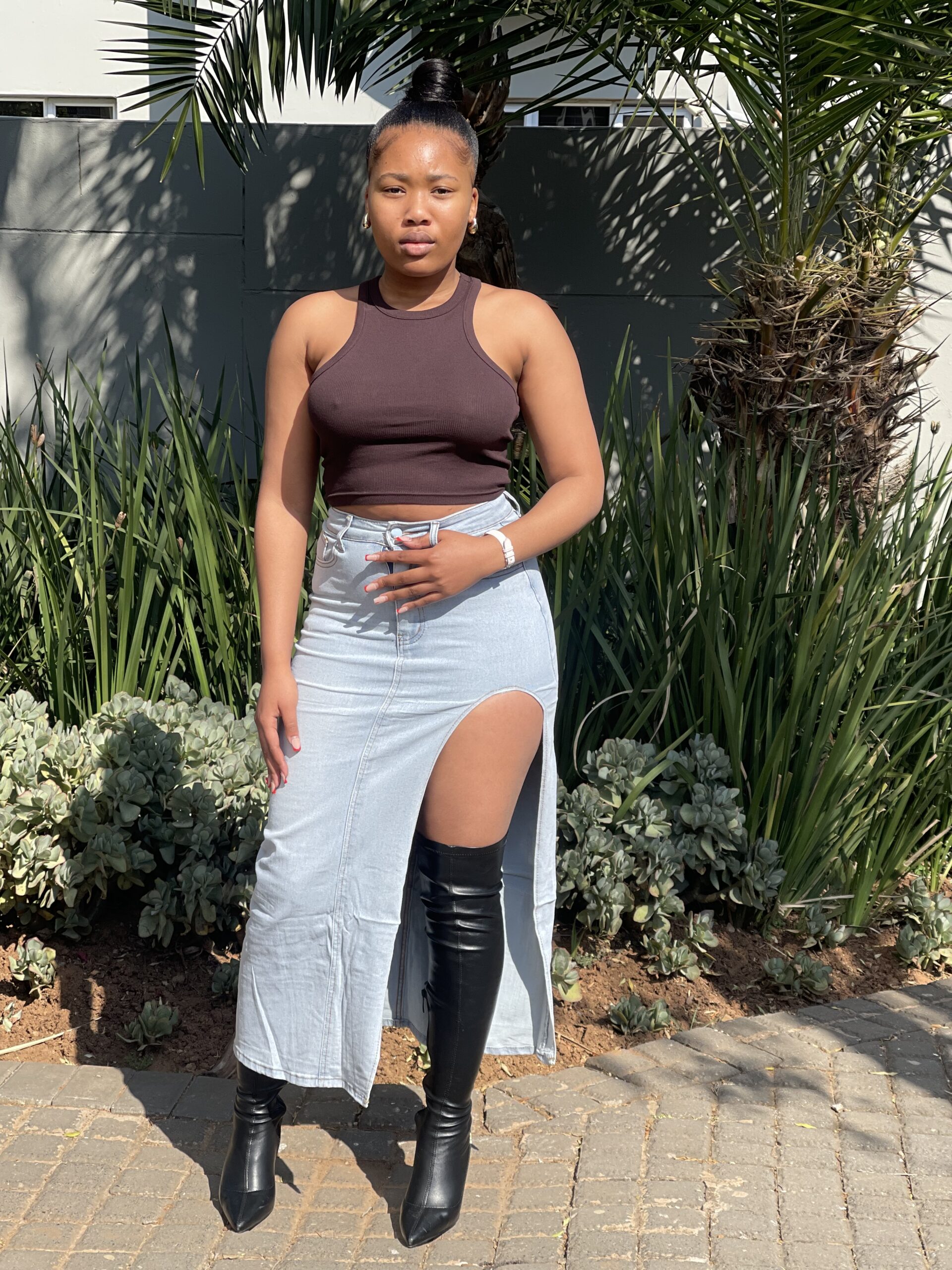 Stylish high slit denim skirt offering a sleek and bold look