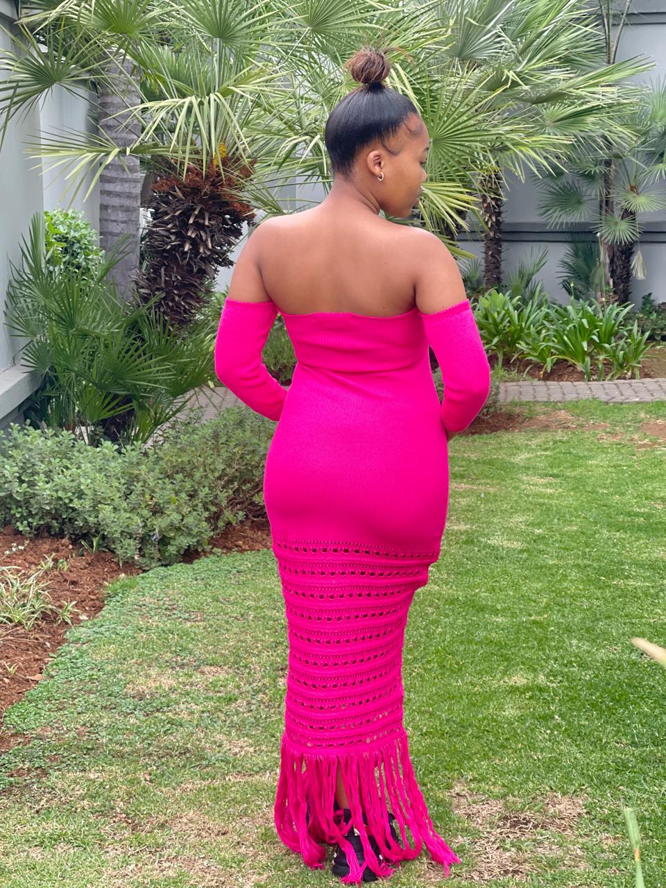 Trendy long pink crochet dress offering a unique, detailed design for women and girls in gauteng